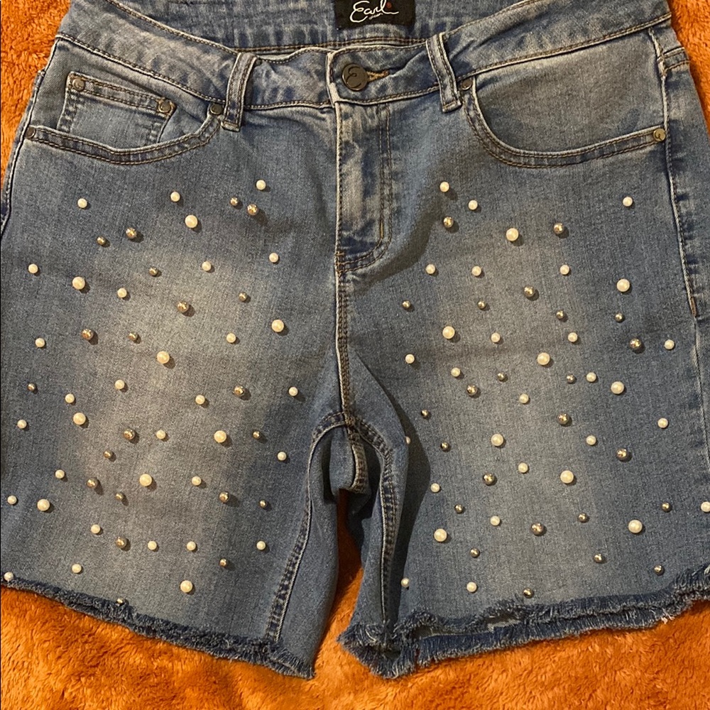Earl Blue Jean Shorts with Studded Pearl Details & ightly frayed hen.